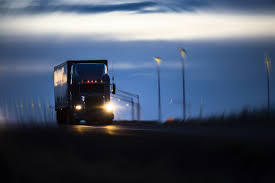 truck_driving_at_night