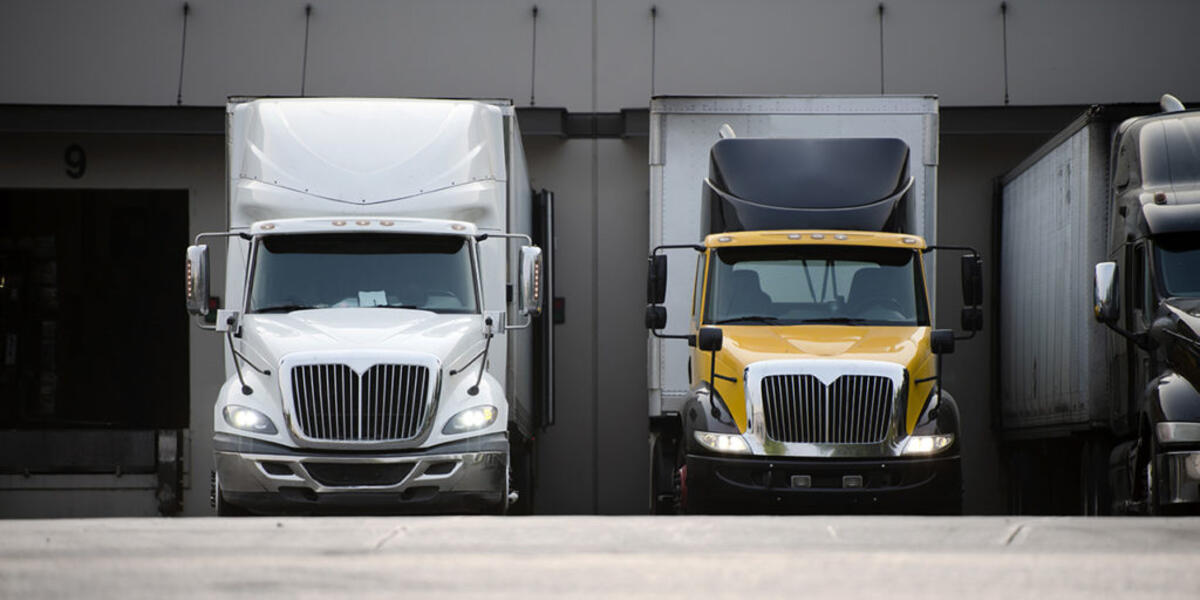 Trucks idling at delivery bay